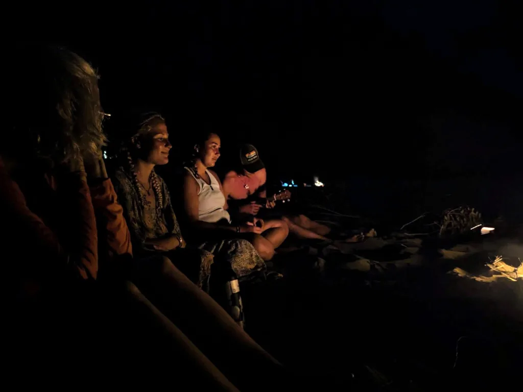 Making lifelong friends around the campfire at Kalalau Beach.