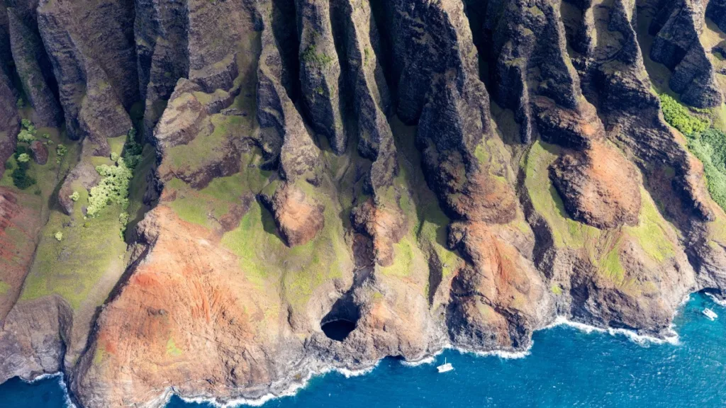See the Napali Coast via helicopter if you can’t get a Kalalau permit
